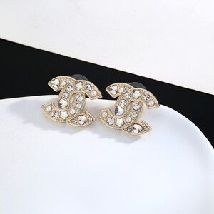 CHANEL Elegant Gold and White Earrings